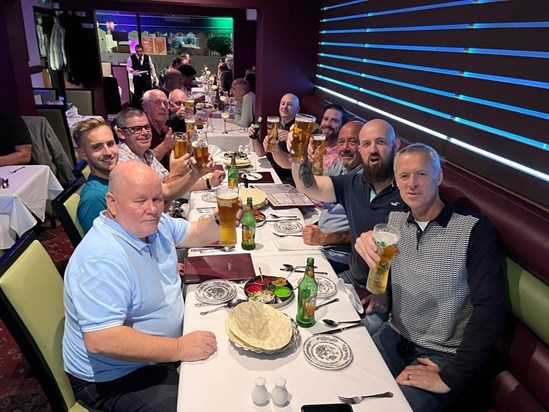 Openreach friends and colleagues raising a glass to Martin. Three vital ingredients that Martin loved - friends, good food and laughter. 
