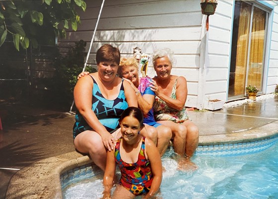 Mum (Helen) sat poolside with her Aunt Sheila, Mum (Cherry) and me