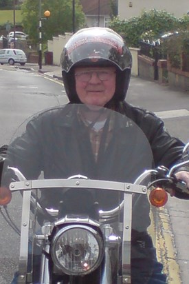 Riding His Harley At 75