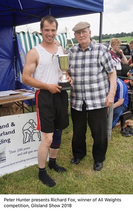 Peter Hunter presents Richard Fox, winner of the All weights at Gilsland Show 2018