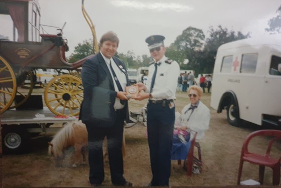 Presentation of BAPS shield to Society Honary President Gordon Turnbull