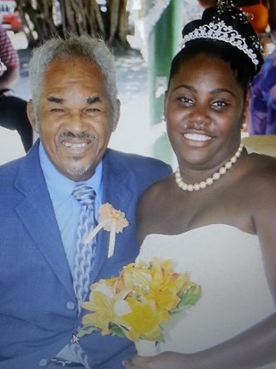 Dad with his granddaughter, Tara at her wedding reception