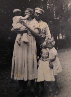 Mum as a baby with Omi, Opa, Barbara and Gigga