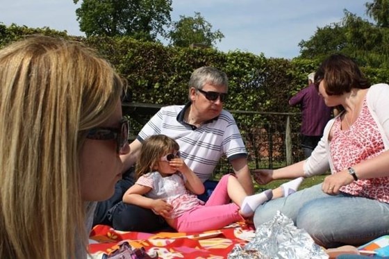 Lauren using Grandad as a chair…!