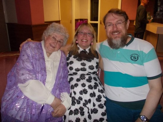 Aunty Margaret, me, and my cousin Mark at a family party.