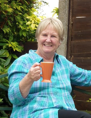 Mum enjoying 'a nice cup of tea' in the garden - 30-9-14