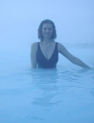 Thelma standing in the much hyped "Blue Lagoon"