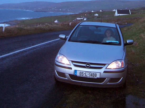 Thelma waiting in our hire car in Fenore, County Clare, Ireland