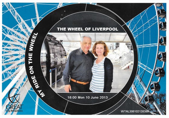 just finished our ride on the "Wheel of Liverpool" (a souvenir photo, 2013)