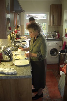 Mother preparing pierogi with Ted