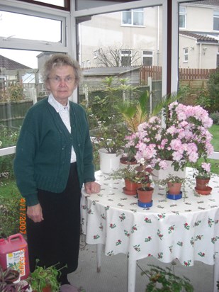 Mother with just some of her many plants