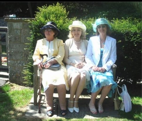 This was taken on our wedding day. I will never forget how beautiful and elegant these three special ladys looked.