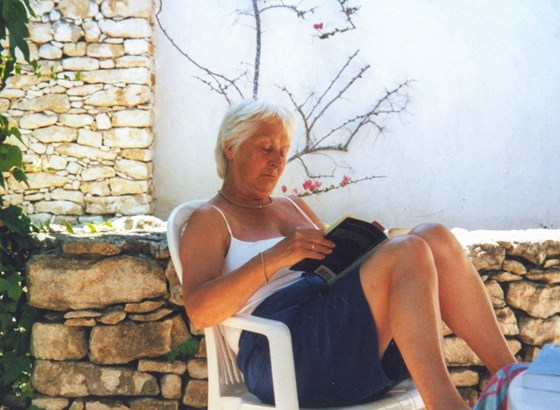 Ann relaxing in the sun outside our house in Bonifacio, Corsica 2003