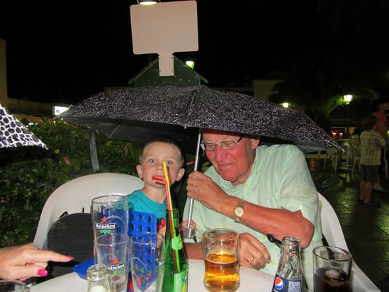 Harry and his Grandad in the rain in Lanzarote!