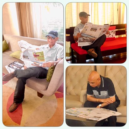 Always reading the newspaper on holiday! 