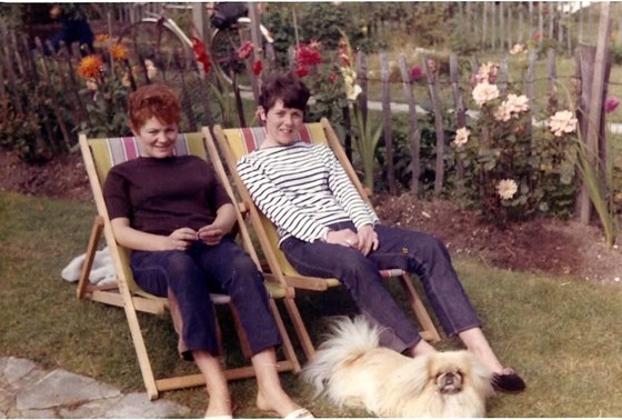 Chris as a youngster with lifelong friend Dot and the family dog Ming
