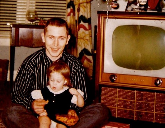 With his oldest daughter in 1956