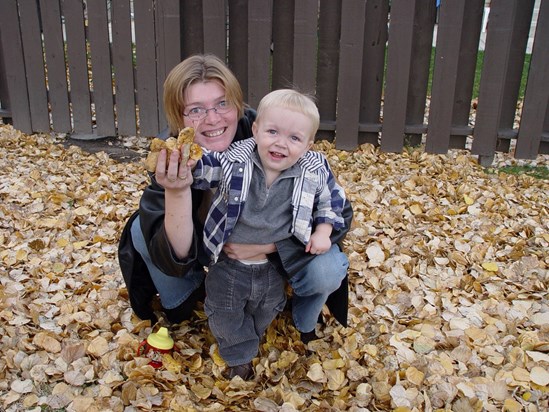 Linda and Ethan in the leaves