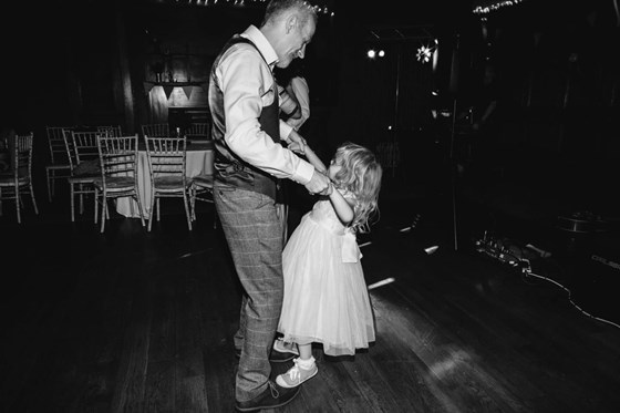 Daisy dancing on Grandad's feet