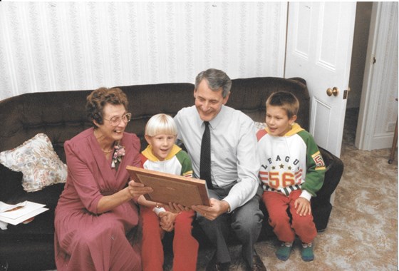 Joan and Bill with grandsons Mark and Adam