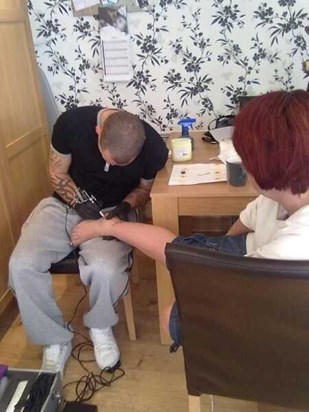 Steve tattooing