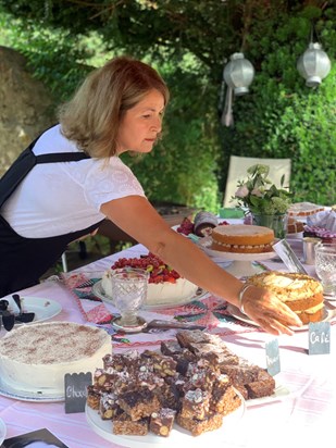Louise (the most wonderful baker) preparing the table