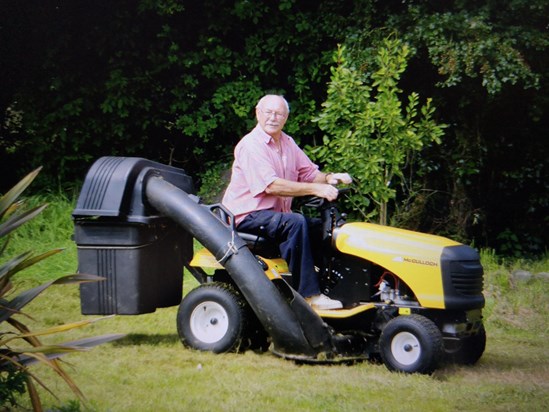Dad on his tractor at the house in Beslon, France