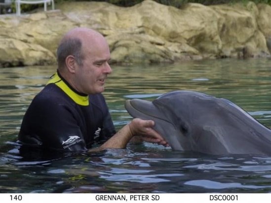 Pete in Orlando, Florida swimming with dolphins, September 2006. 