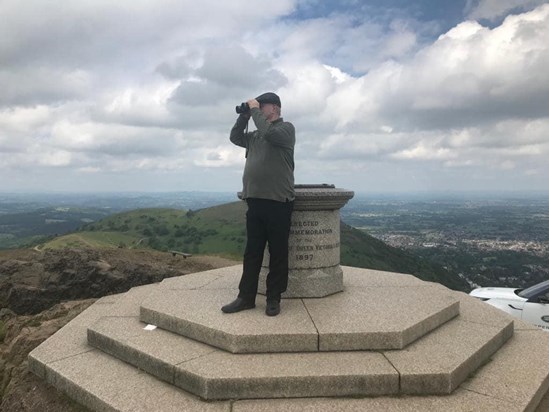 Enjoying the view from Malvern Hills beacon, June 2022