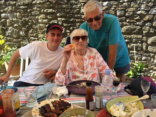 Mum June, Phil and Sam. Having lunch in the garden. Summer 2018. ??