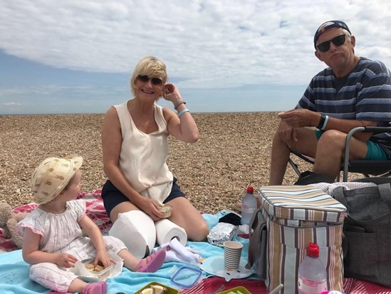 Malin having a picnic on the beach with Mama and Papa. Summer 2018 xx 