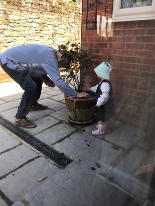 Helping Papa in the garden 
