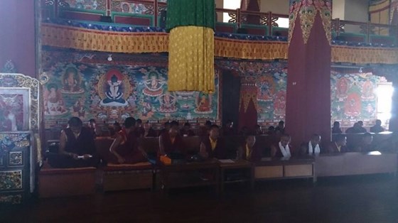 Buddhist monks praying for William