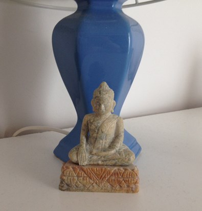 A Buddha by my bedside lamp (bought by Harri in Cambodia). The twin is in the kitchen.