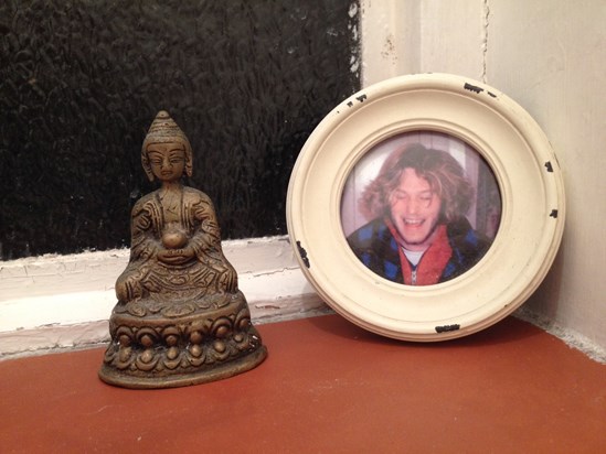 A tiny Buddha - next to one of our favourite pics of Will (in the downstairs loo!).