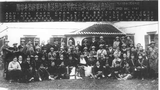 Escape group, Dec 1941, Waichow, China (Lt Kennedy seated far right)
