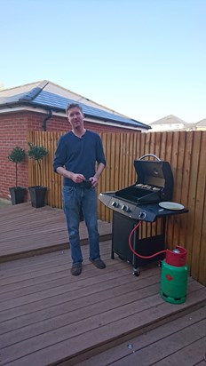 Sam White and his barbecue. One of his hobbies