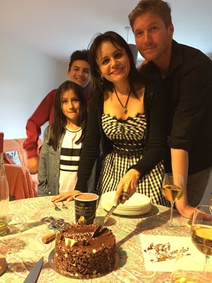 Sam White with kids on a  birthday in 2017