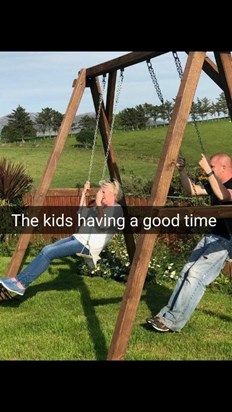 James and Anne having a swing