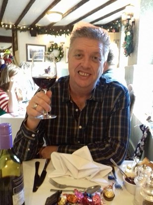 Paul enjoying a glass of red wine 