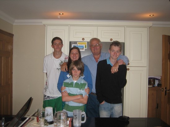 At home in Wales with grandchildren Connor, Kallum and Blue