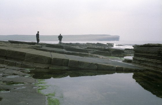 Stephen Salter on the rocks of Orkney looking at the Atlantic Ocean 1992. The photo was taken by Peter Randløv during a project meeting on the “Preliminary Actions on Wave Energy” - with love and respect Kim Nielsen