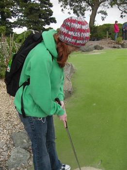 Hannah playing golf 2010