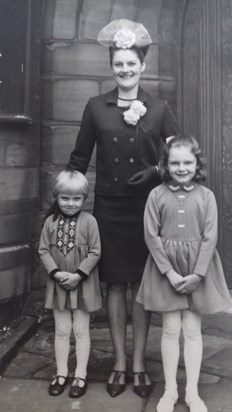 Mum, Vivienne and me at a wedding. I remember I loved that dress because it had bells on the cuffs!