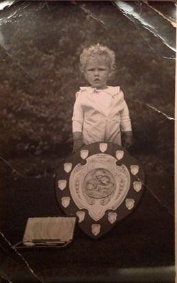 Malcolm winning a beautiful baby competition in the 1930's