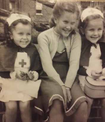 Happy childhood memories with my two dear sisters, and our little sister Lyn on the left. Marilyn