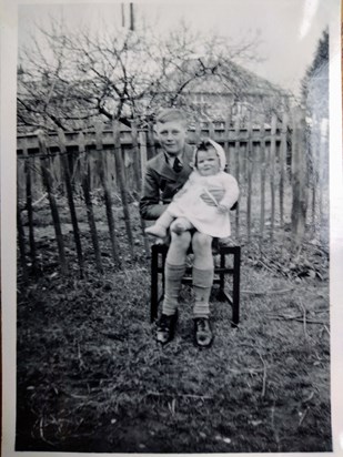 Leonard with his first cousin Susan at their Dakin grandmother & aunts' house. 1951