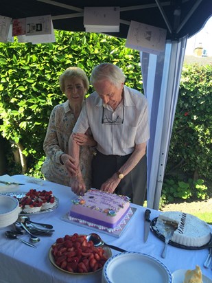Cutting the cake at 70th Wedding Anniversary  August 2016