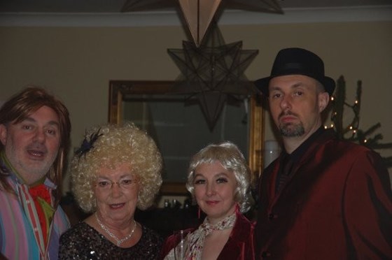 Dressed in 1960's attire for Christmas family Murder Mystery