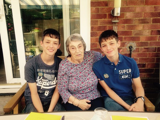 Sheila with her handsome grandchildren: Jon and Ed.